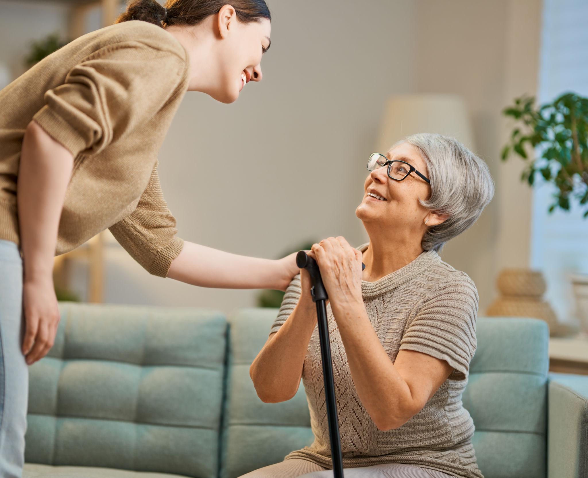 A compassionate companion sharing a genuine moment of connection with an older adult